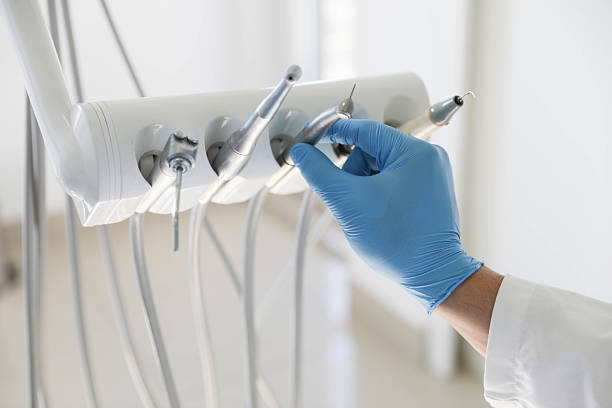 Professional Dental Implants technician working in Scanlon, MN